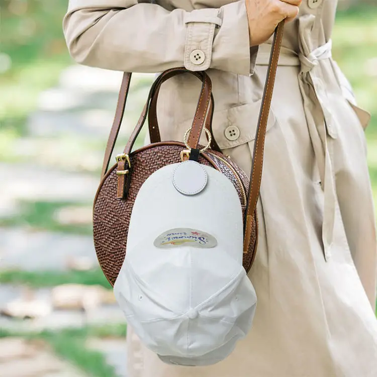 Attache-chapeau pour sac